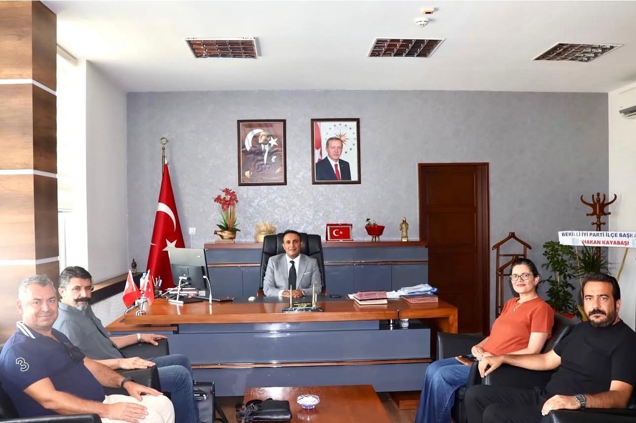 pau-bekilli-meslek-yuksekokulu-yonetiminden-kaymakam-abdullah-melikoglu’na-hayirli-olsun-ziyareti
